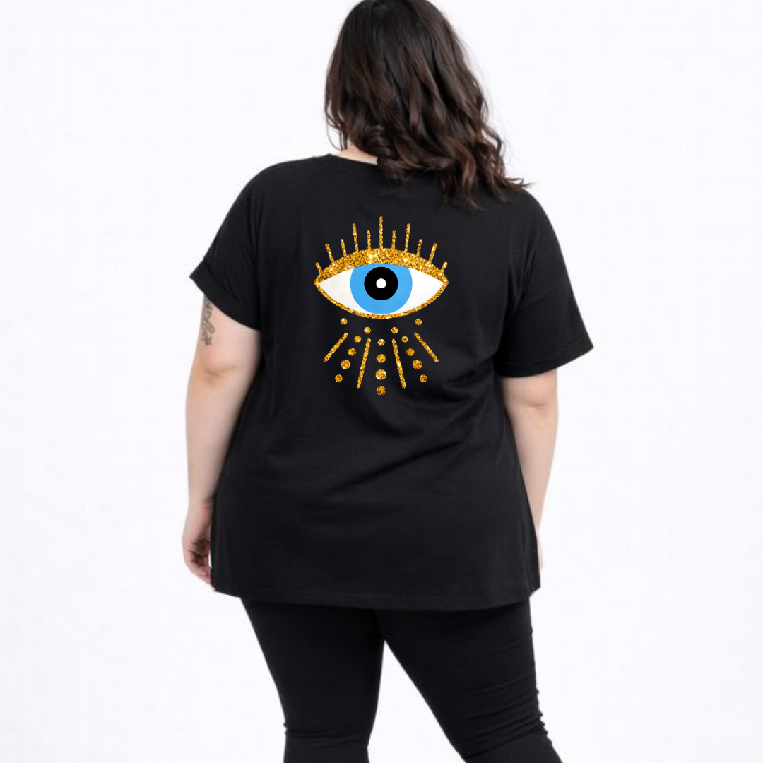 Person wearing a black t-shirt with an eye design on the back, standing against a white background