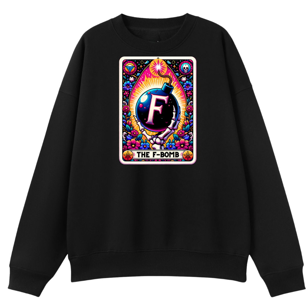 A black crewneck sweatshirt featuring a colorful graphic print on the chest. The graphic is styled like a retro card with a bomb illustration, a large letter 'F' in the center, and the text 'THE F-BOMB' at the bottom.