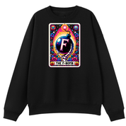 A black crewneck sweatshirt featuring a colorful graphic print on the chest. The graphic is styled like a retro card with a bomb illustration, a large letter 'F' in the center, and the text 'THE F-BOMB' at the bottom.