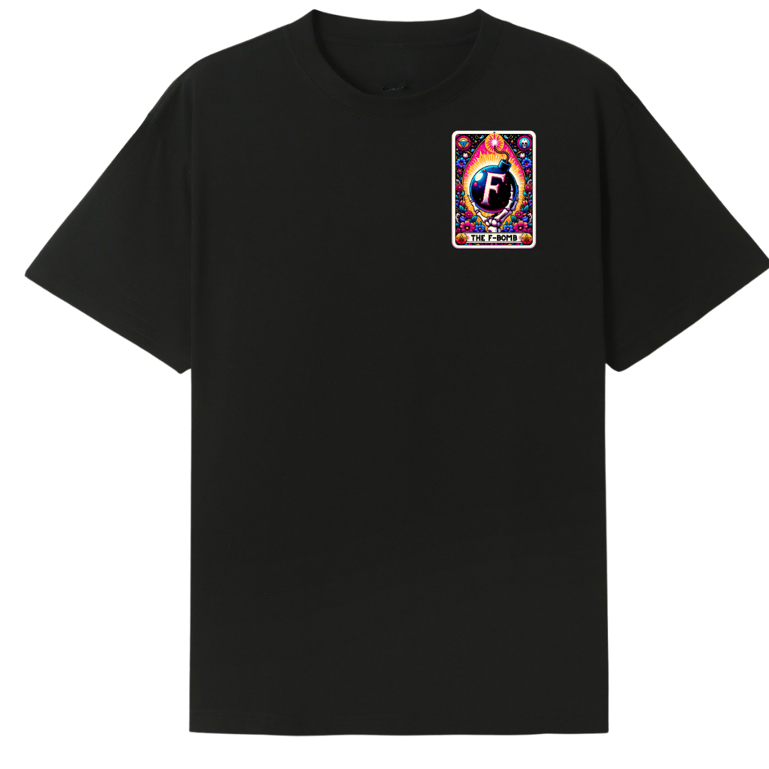 A black short-sleeve crewneck t-shirt featuring a colorful graphic print on the left chest. The graphic is styled like a playing card with a large letter 'F' in the center and the text 'F-FLYING' at the bottom.