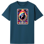 A dark teal blue short-sleeve t-shirt with a colorful graphic print on the chest. The graphic is styled like a retro card with a bomb illustration and the text 'THE F-BOMB'.