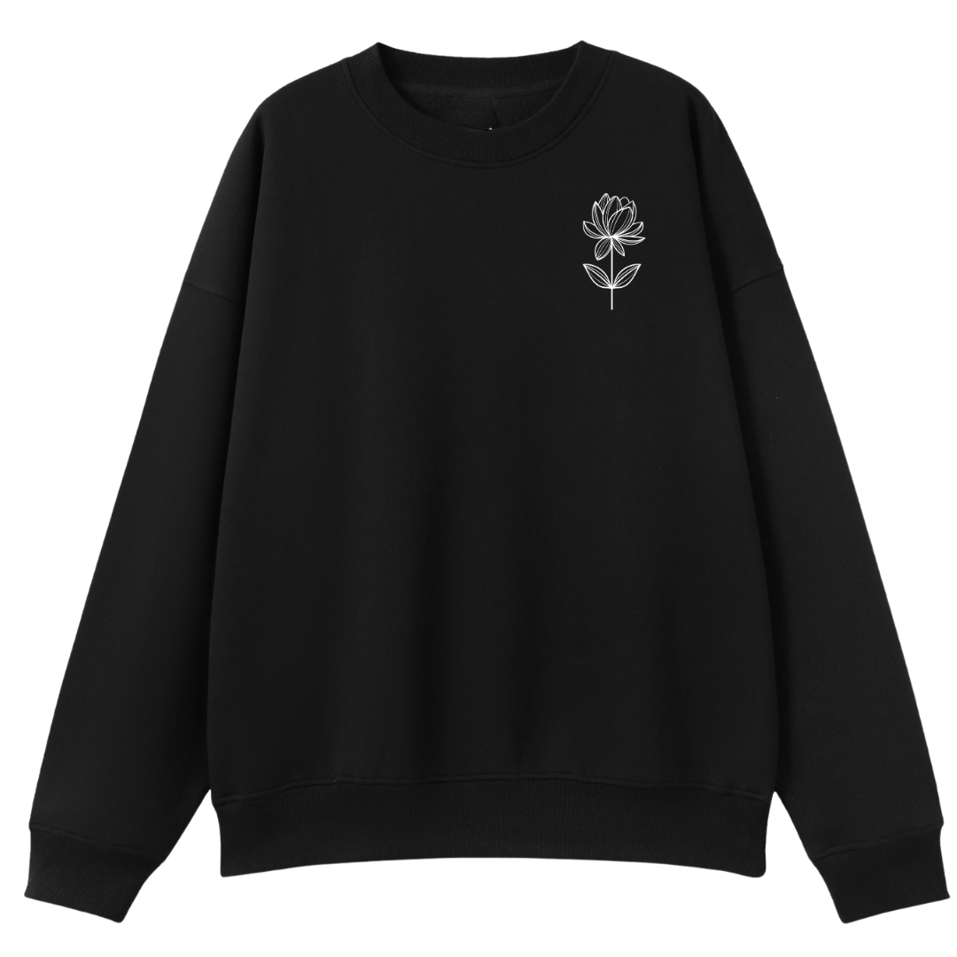 A black crewneck sweatshirt with a small graphic print on the left chest showing two cartoon characters dressed in gothic attire, one wearing a brown hat and the other a black top hat, set against a plain white background.