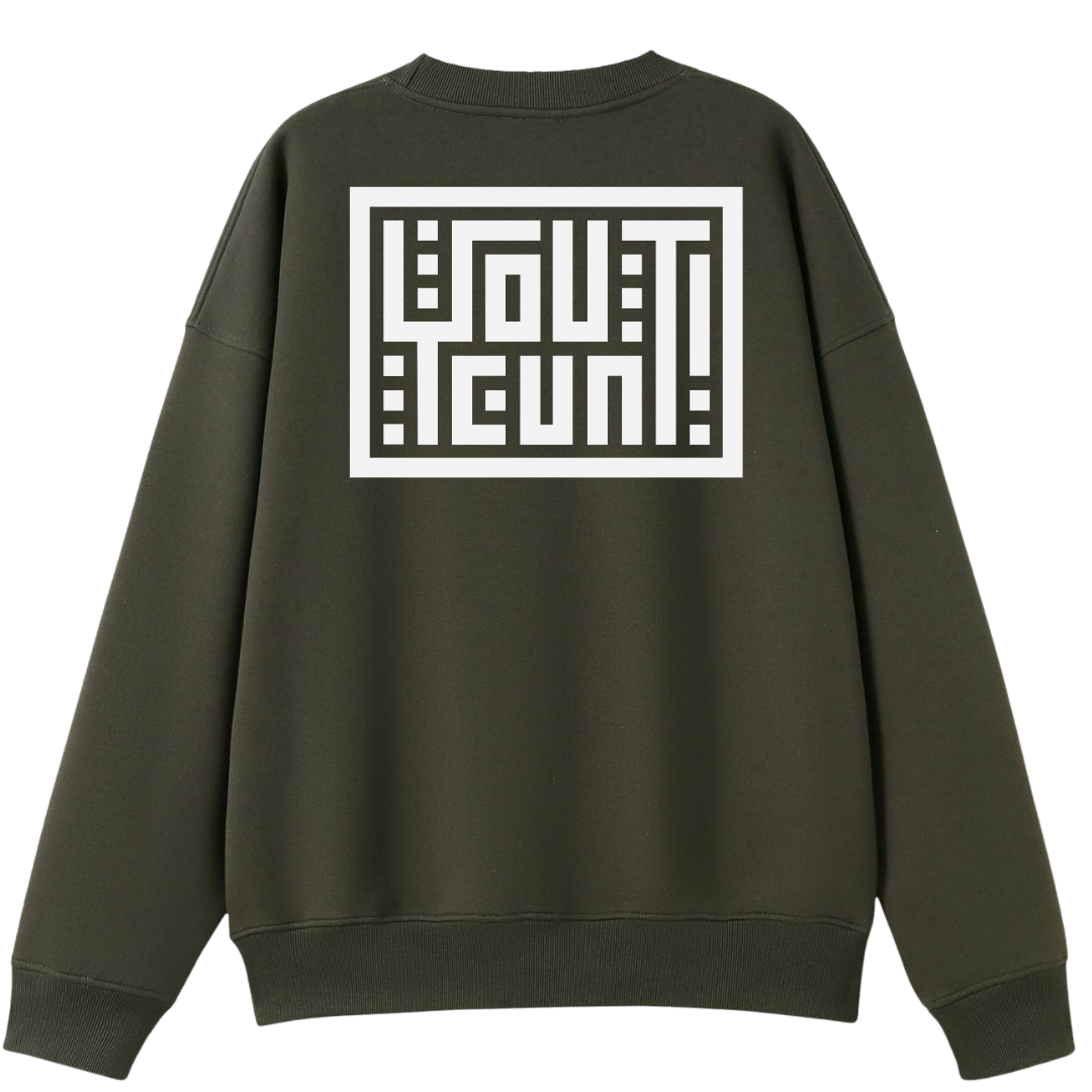 An olive green crewneck sweatshirt shown from the back, featuring a large white graphic print with stylized text inside a rectangular border.