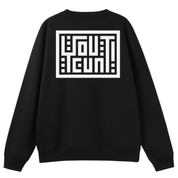 A black crewneck sweatshirt shown from the back, featuring a large white geometric graphic print on the upper back.