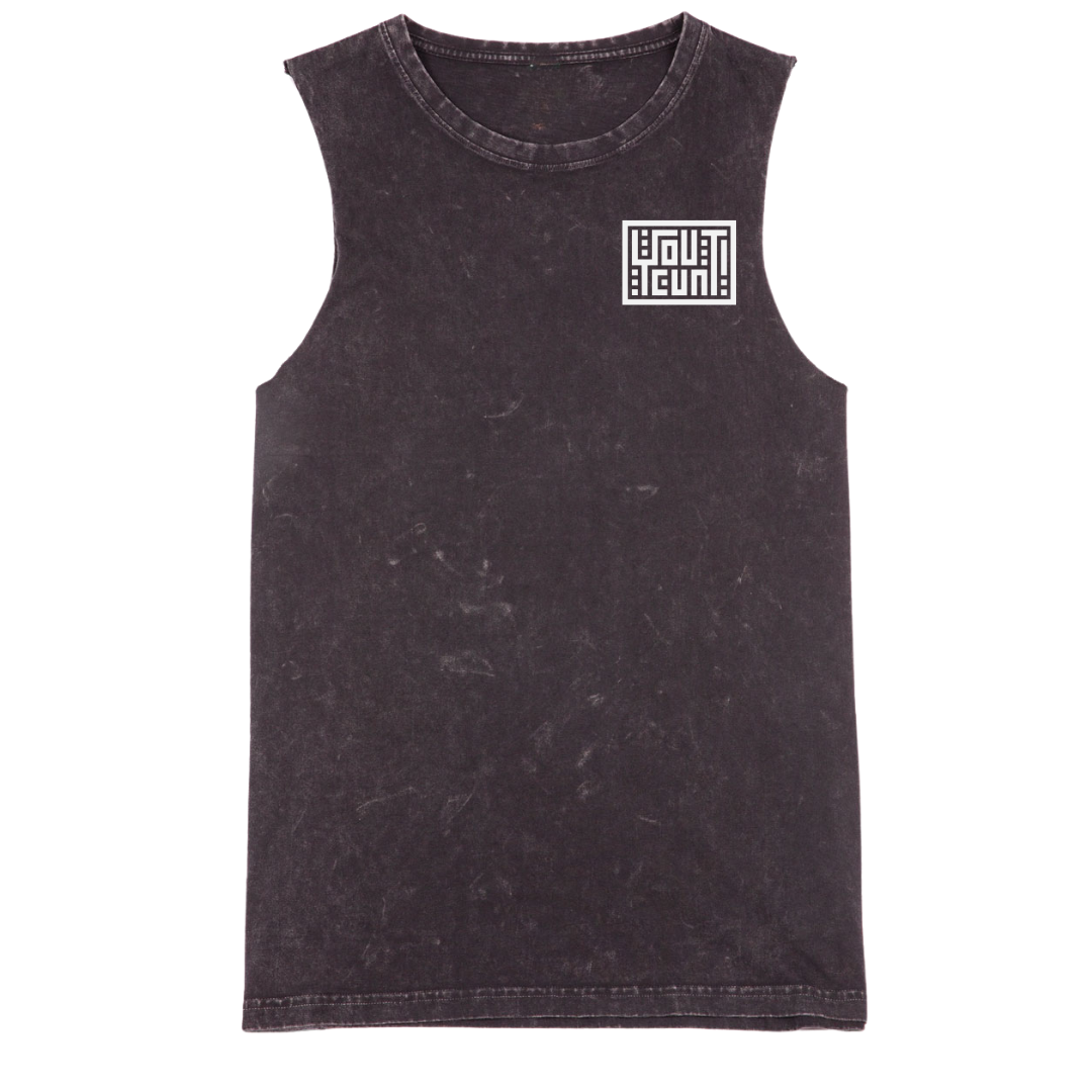 A sleeveless black tank top with a mineral wash finish, featuring a white square graphic on the left chest that reads 'TRUST AGAIN!'. The tank top is displayed flat against a solid white background.