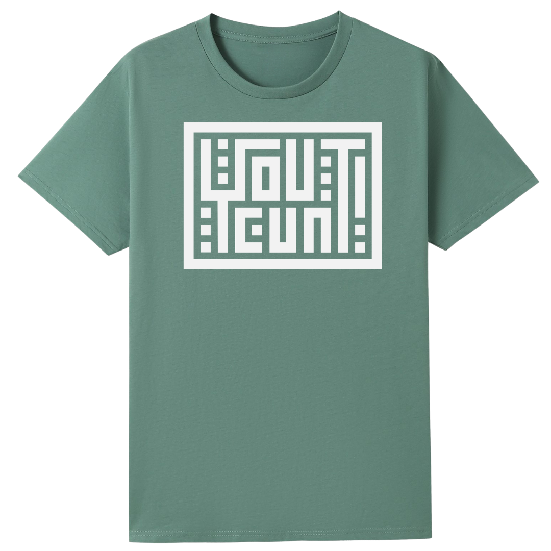 A sage green short-sleeve crewneck t-shirt featuring a white geometric maze graphic on the chest that spells out 'OUT OF COMFORT' in a stylized block font.