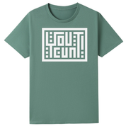 A sage green short-sleeve crewneck t-shirt featuring a white geometric maze graphic on the chest that spells out 'OUT OF COMFORT' in a stylized block font.