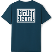 A dark teal blue short-sleeve t-shirt with a large white graphic print on the back. The graphic features a white rectangular border enclosing stylized text that reads 'I GOT THIS' in a blocky, geometric font.