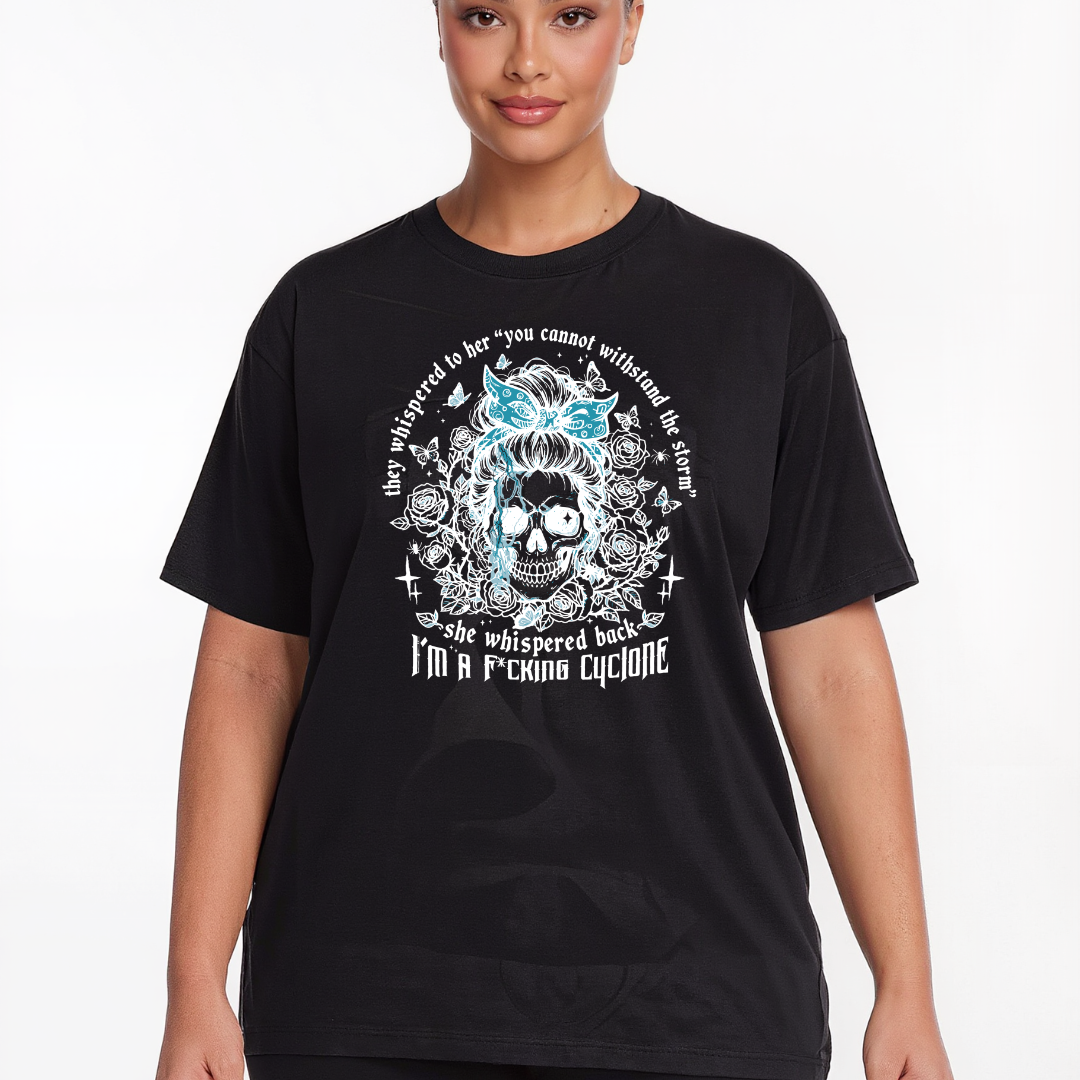 Person wearing a black t-shirt with a graphic design and text.