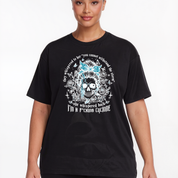 Person wearing a black t-shirt with a graphic design and text.