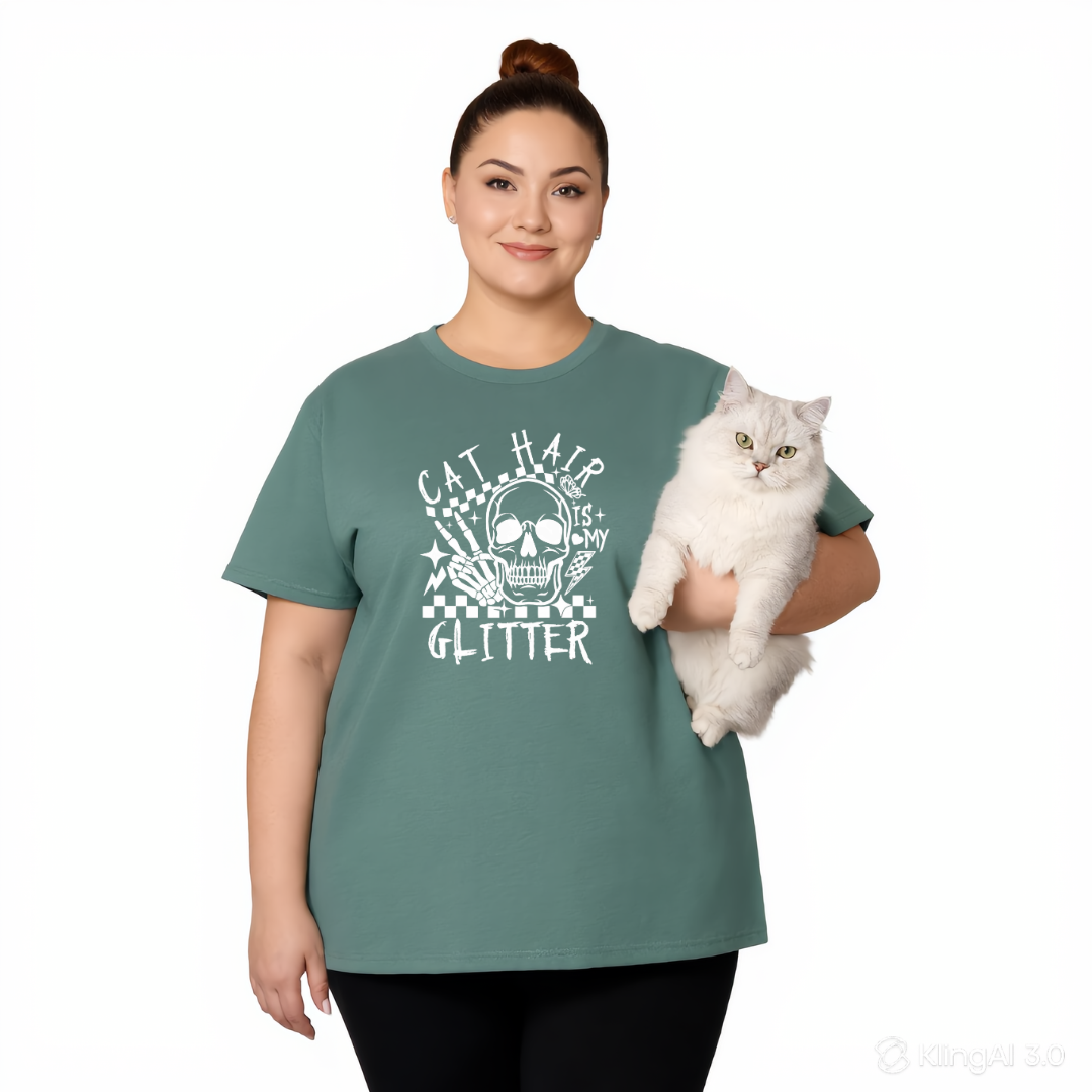 Woman wearing a teal t-shirt with a cat-themed design, holding a white cat on a white background.