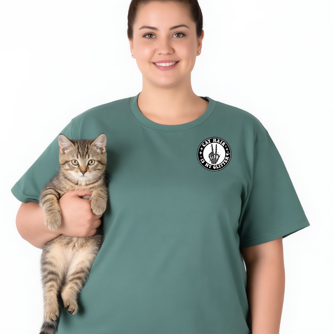 Person wearing a green t-shirt with a logo holding a cat on a white background