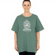 Person wearing a green t-shirt with white text and design on a white background