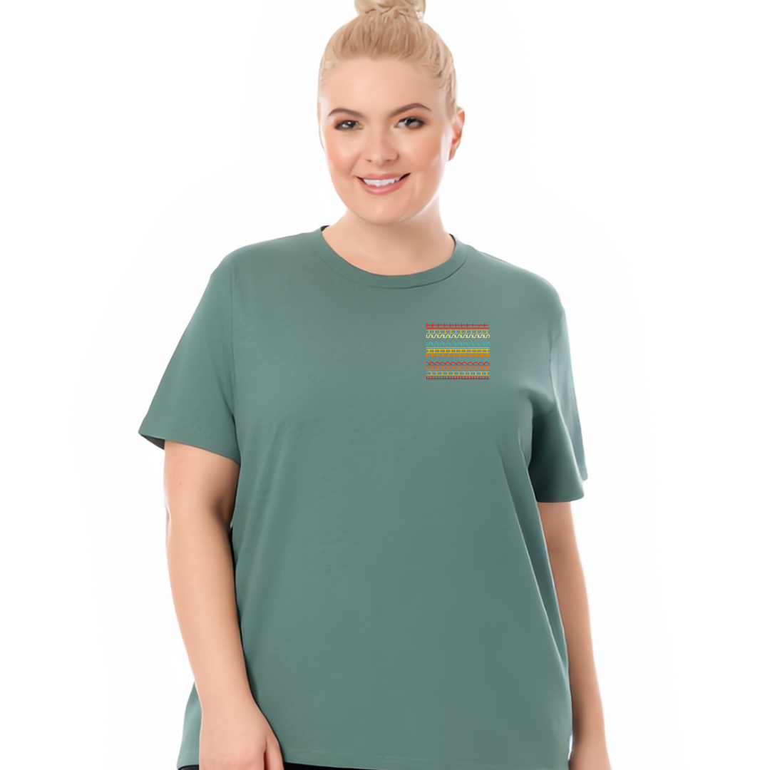 Woman wearing a green t-shirt with a small graphic on a white background