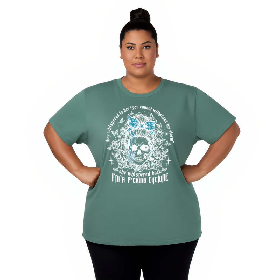 Woman wearing a green t-shirt with a skull design and text on a white background