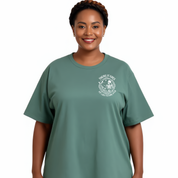 Woman wearing a green t-shirt with a logo on a white background