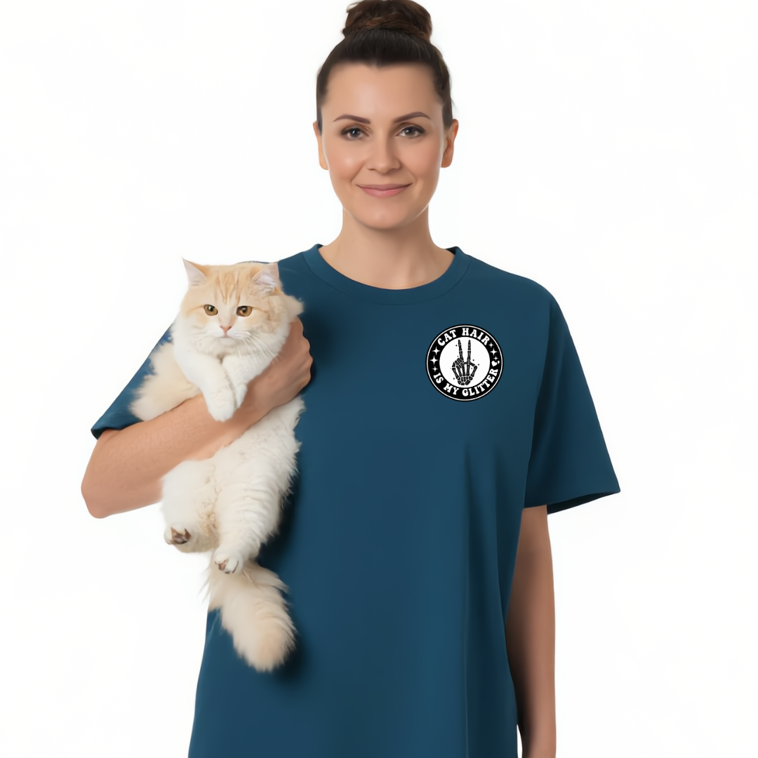 Woman holding a cat wearing a blue t-shirt with a logo on a white background