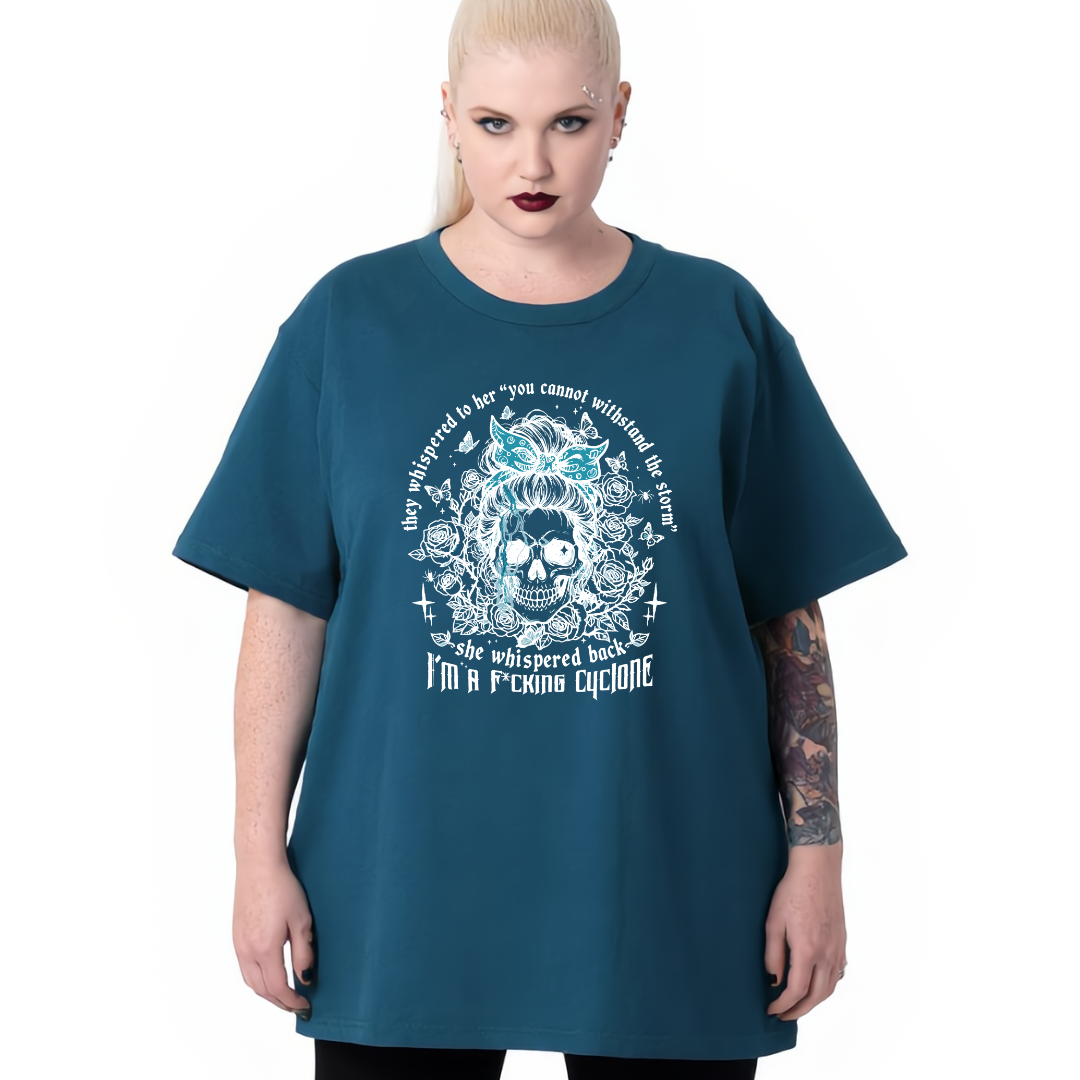Person wearing a teal t-shirt with a skull design and text on a white background