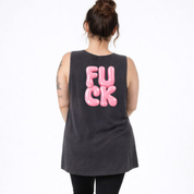 Person wearing a black sleeveless shirt with pink text on the back against a white background