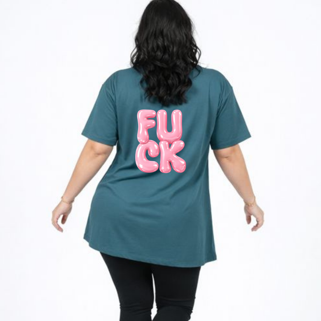 Person wearing a teal t-shirt with pink text on the back against a white background