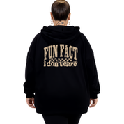 Back view of black Fun Fact I Don't Care hoodie showing full distressed varsity text DTF print detail, relaxed plus size fit, Bae Bands Australia
