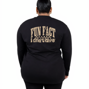 Back view of black Fun Fact I Don't Care long sleeve tee showing full distressed varsity text DTF print detail, relaxed plus size fit, Bae Bands Australia