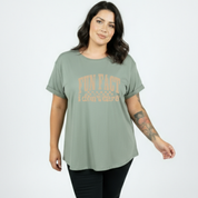 front view of slate green Fun Fact I Don't Care oversized tee showing relaxed plus size fit, bold distressed text DTF print, Bae Bands Australia