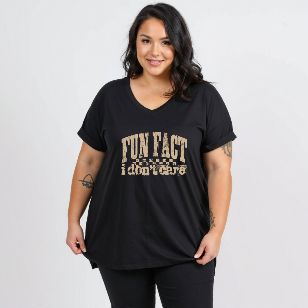 Woman wearing black v-neck graphic tee with Fun Fact I Don't Care distressed varsity text DTF print, plus size Australian streetwear by Bae Bands