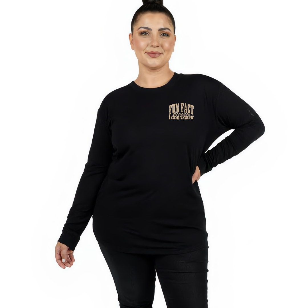 Woman wearing black long sleeve graphic tee with Fun Fact I Don't Care distressed varsity text DTF print, plus size Australian streetwear by Bae Bands