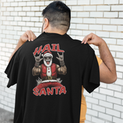 Person wearing a black t-shirt with 'Hail Santa' graphic design.