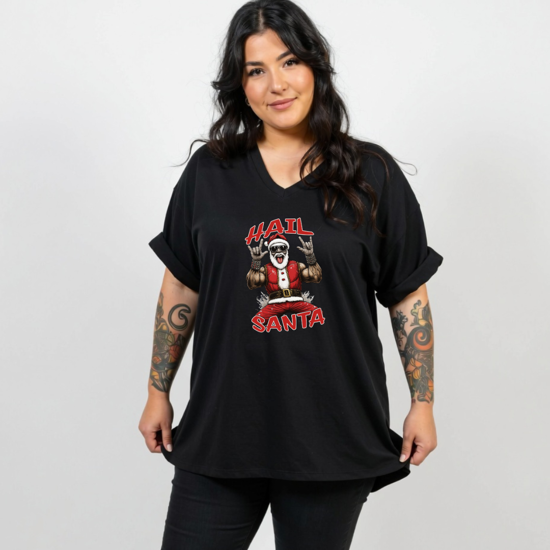 Woman wearing a black t-shirt with a graphic design of Santa Claus and text on a white background