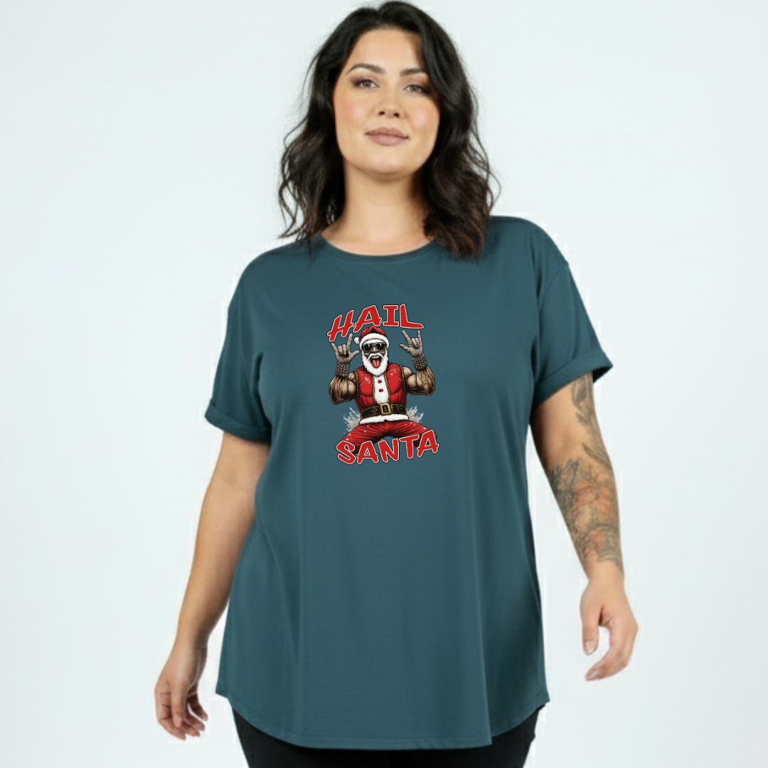 Woman wearing a teal t-shirt with a graphic design on a light blue background