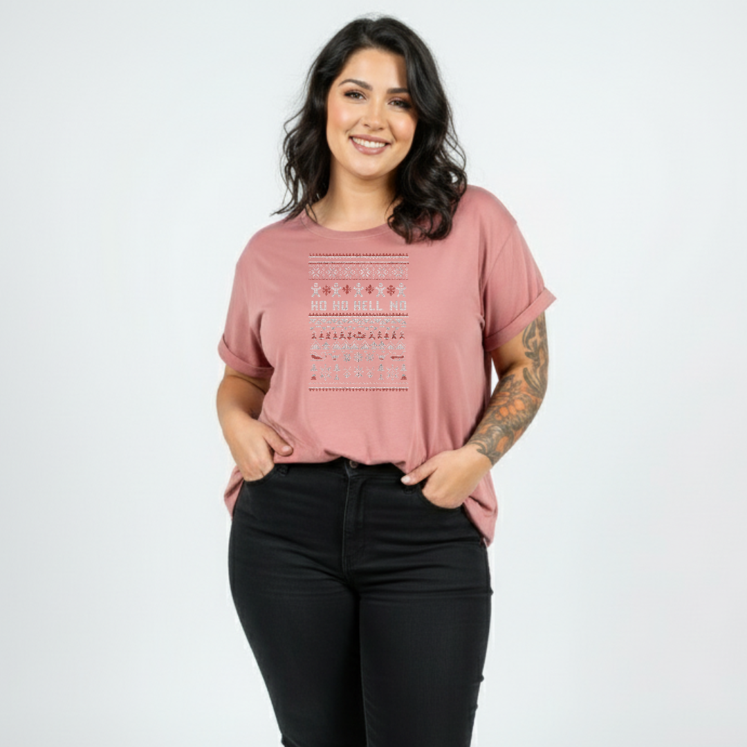 Woman wearing a pink t-shirt with a pattern and black pants on a white background