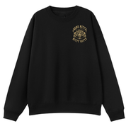 A black crewneck sweatshirt with a gold graphic on the left chest featuring a kitten illustration and the text 'HERE KITTY KITTY'.
