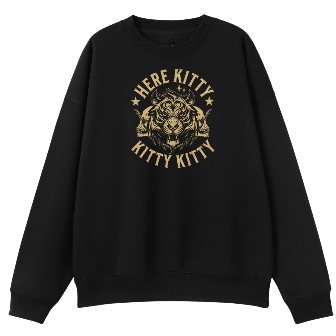 A black crewneck sweatshirt featuring a gold graphic print on the front with a tiger's face, stars, and the text 'HERE KITTY KITTY KITTY'.
