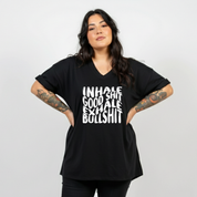 Woman wearing black v neck graphic tee with Inhale Good Shit Exhale Bullshit bold stacked white text DTF print, plus size Australian streetwear by Bae Bands