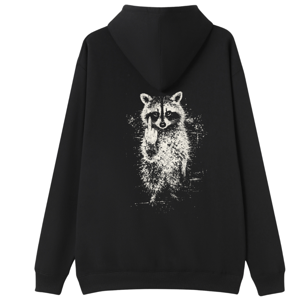 A black pullover hoodie shown from the back, featuring a distressed white graphic print of a raccoon holding up a middle finger, set against a plain white background.