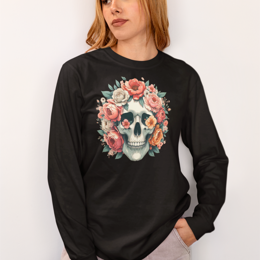 Black long-sleeve shirt with a skull and floral design worn by a person on a white background
