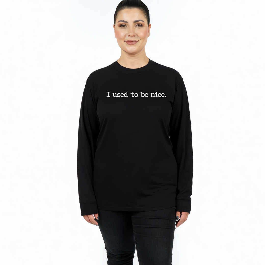 Woman wearing black long sleeve tee, relaxed fit, plus size Australian streetwear by Bae Bands