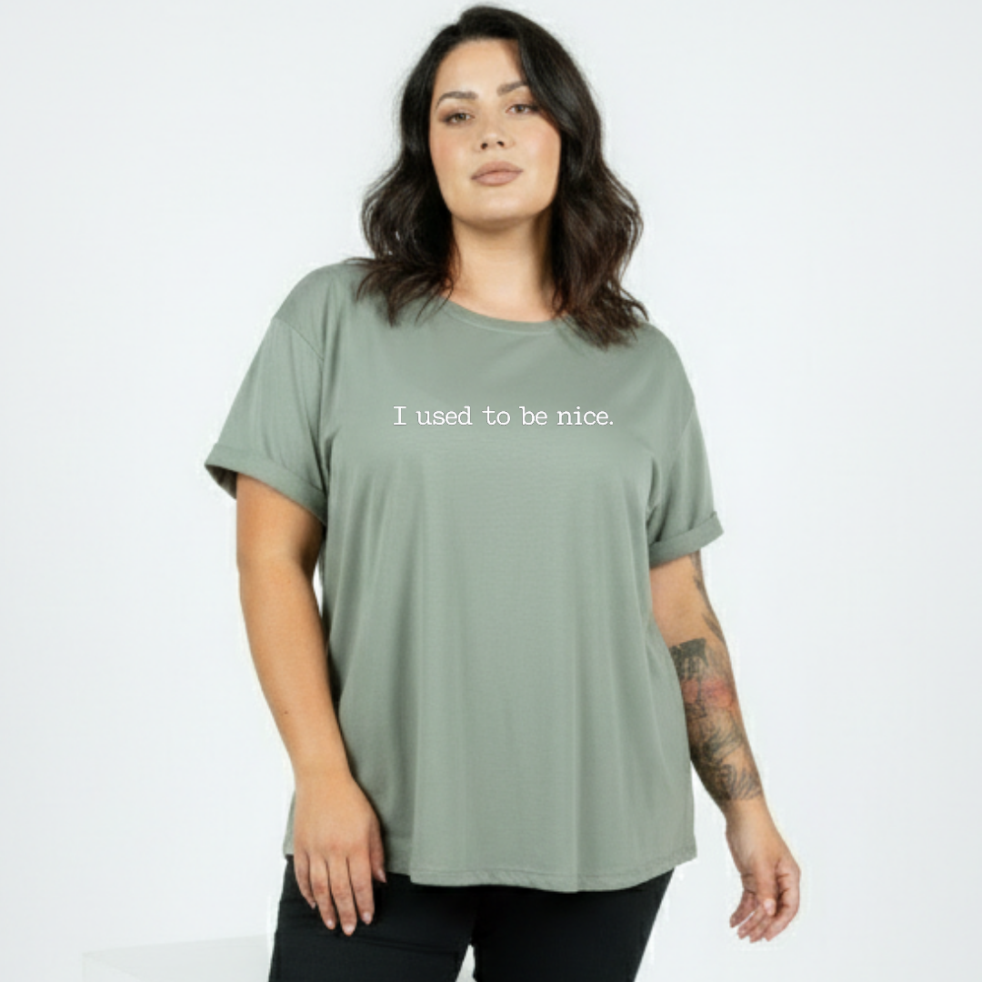 Woman wearing slate green oversized relaxed fit tee, plus size Australian streetwear by Bae Bands