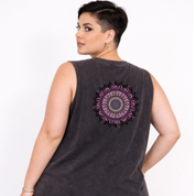 Woman wearing black stonewashed tank top with large intricate pink and teal mandala back print, plus size Australian streetwear by Bae Bands