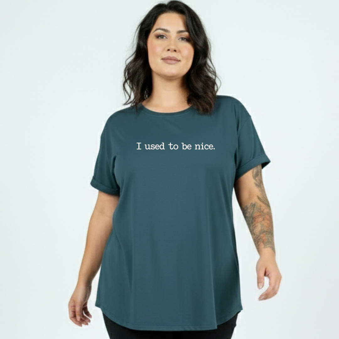 Woman wearing teal oversized relaxed fit tee, plus size Australian made streetwear by Bae Bands