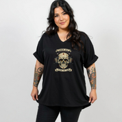 Woman wearing black v neck graphic tee with Error 404 Patience Not Found cyber skull in headphones DTF print, plus size Australian streetwear by Bae Bands