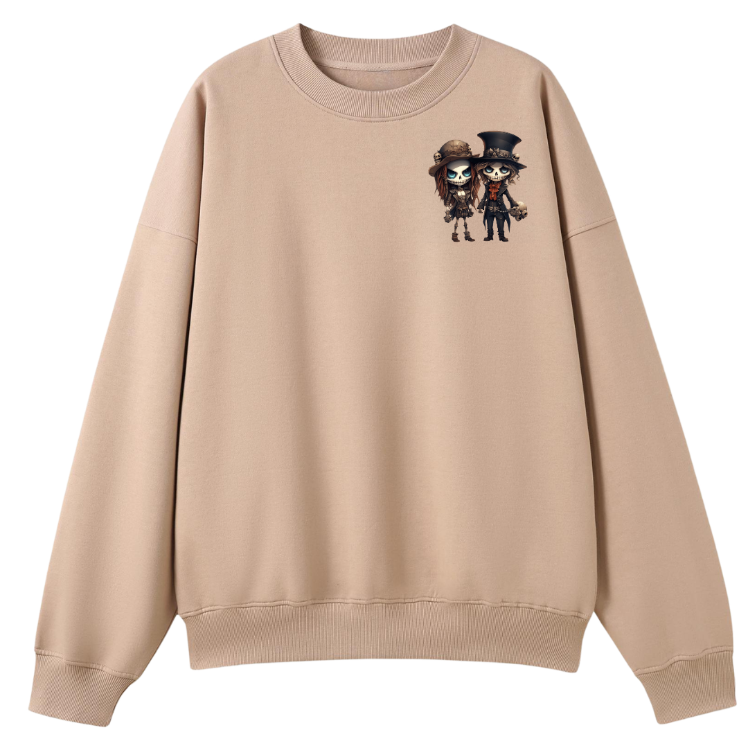 A beige crewneck sweatshirt featuring a small graphic print of two chibi anime characters on the left chest, displayed against a solid white background.