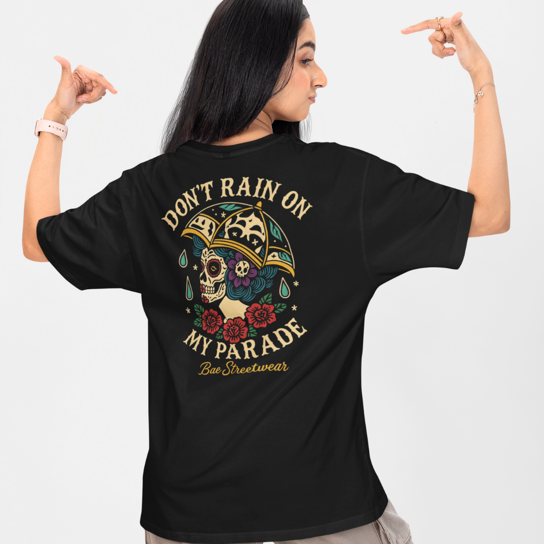 Plus-size black oversized tee with ‘Don’t Rain On My Parade’ text and colorful sugar skull under umbrella graphic surrounded by red roses – Bae Streetwear Melbourne streetwear