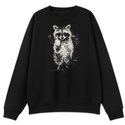 A black crewneck sweatshirt featuring a white distressed graphic of a raccoon on the front, displayed against a solid white background.