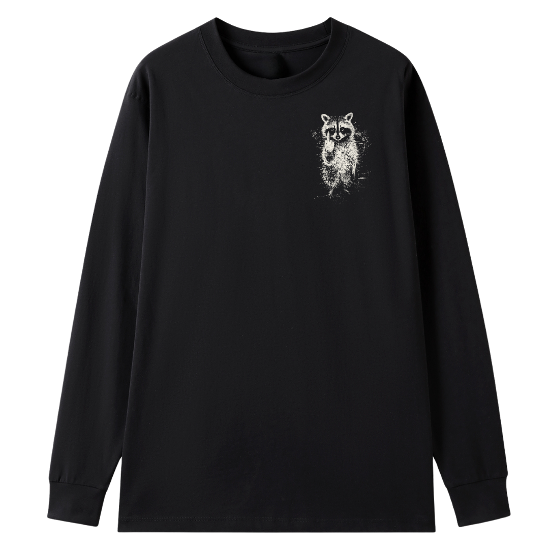 A black long-sleeve crewneck t-shirt featuring a small white sketch-style graphic of a raccoon on the left chest, displayed against a solid white background.