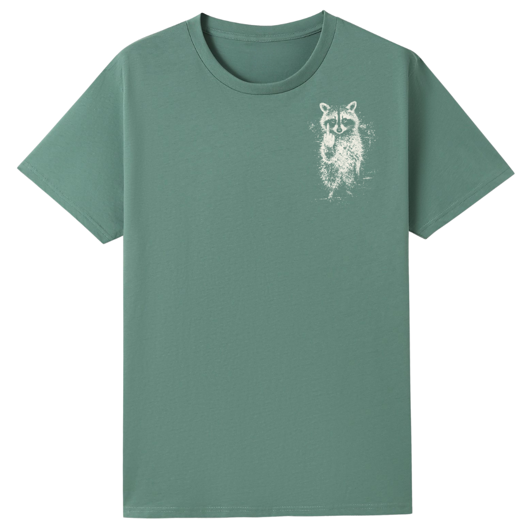 A sage green short-sleeve crewneck t-shirt featuring a distressed white graphic of a raccoon on the left chest, displayed on a solid white background.