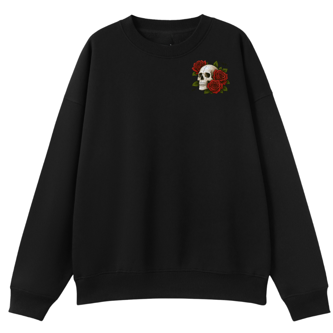 A black crewneck sweatshirt featuring a small chest graphic of a white skull surrounded by red roses with green leaves, displayed against a solid white background.