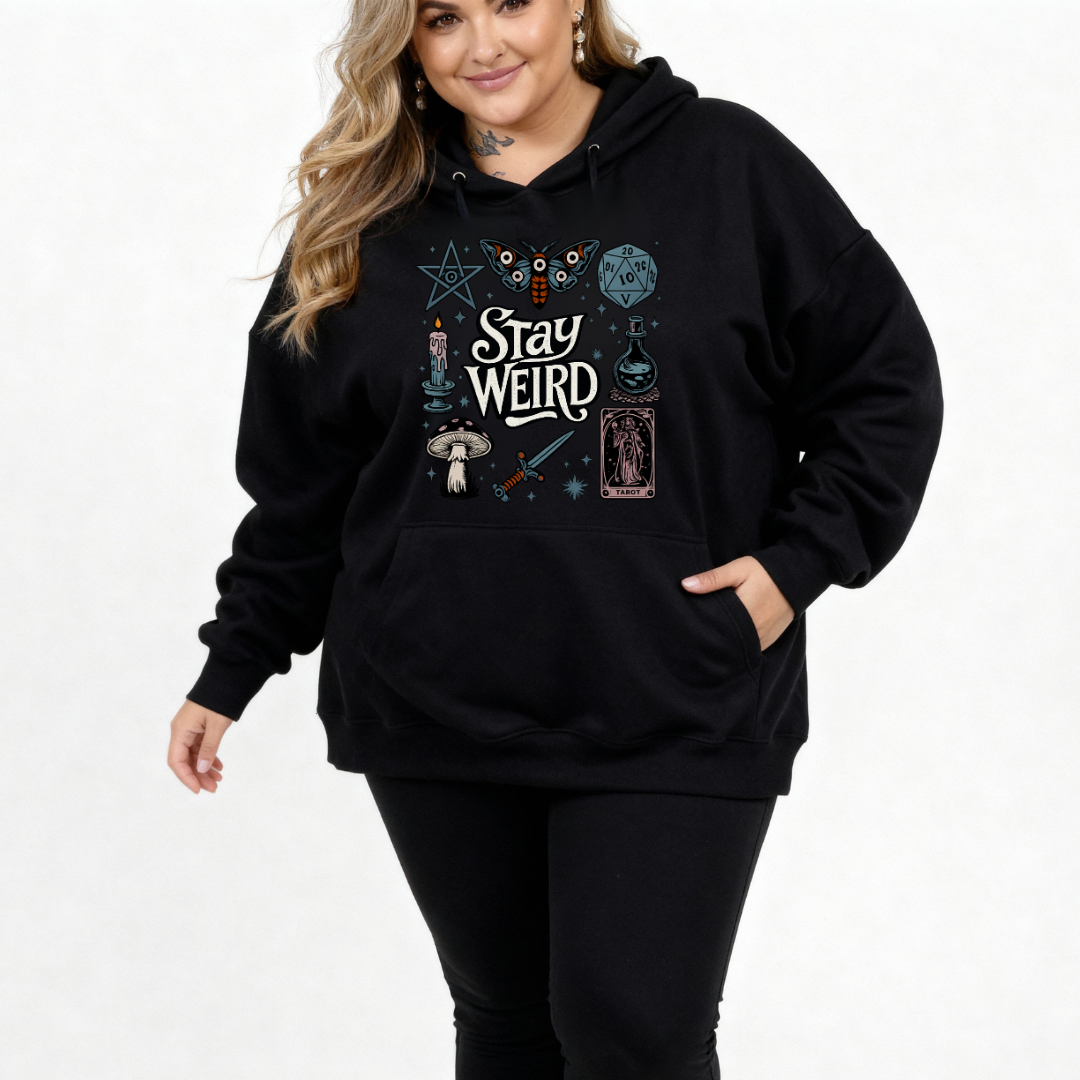 Woman wearing black oversized graphic hoodie with Stay Weird witchy illustration back print, plus size Australian streetwear by Bae Bands